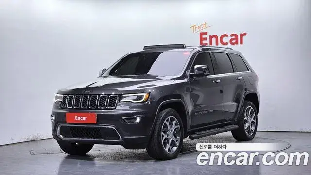Jeep Grand Cherokee 2021 — Фото 1/20