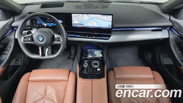 BMW 5 Series 2024 — ფოტო 25/34