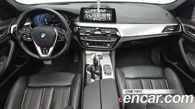 BMW 5 Series 2018 — Фото 7/20