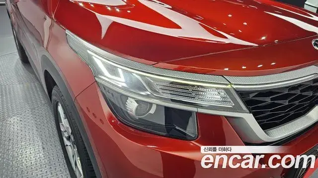 Kia Seltos 2021 — ფოტო 12/30