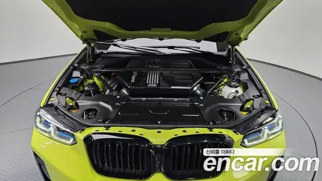BMW X4M 2022 — ფოტო 7/32