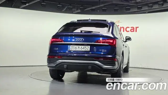 Audi Q5 2022 — ფოტო 16/37