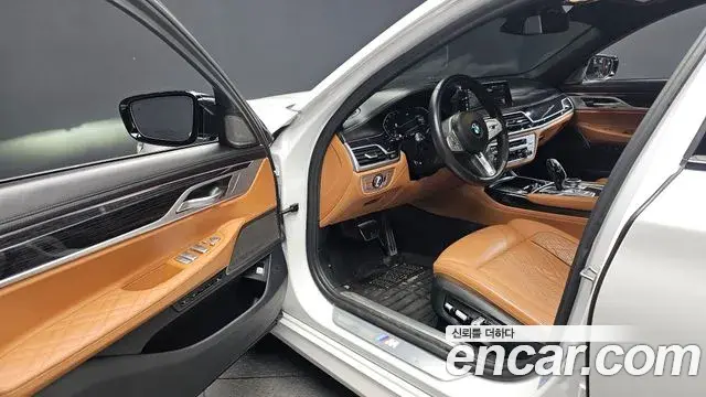BMW 7 Series 2019 — Фото 10/20