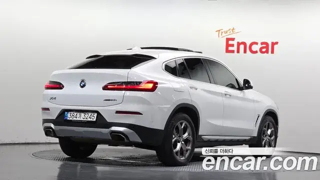 BMW X4 2022 — Фото 1/20