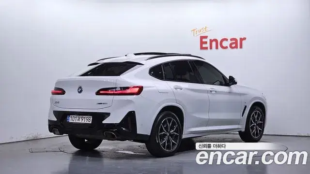 BMW X4 2022 — Фото 2/20