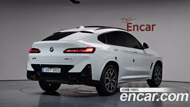 BMW X4 2022 — Фото 2/20