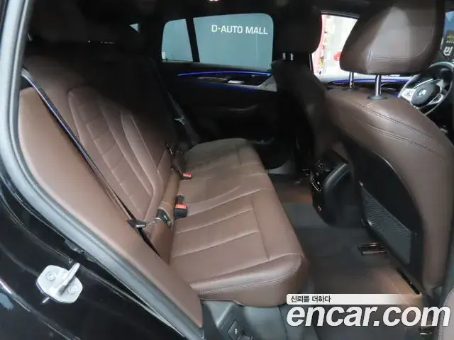 BMW X4 2023 — Фото 12/20