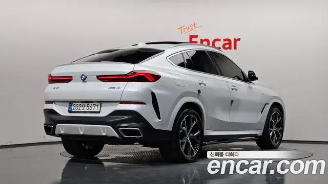 BMW X6 2022 — Фото 2/20