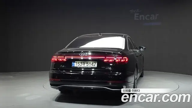 Audi A8 2023 — Фото 4/20
