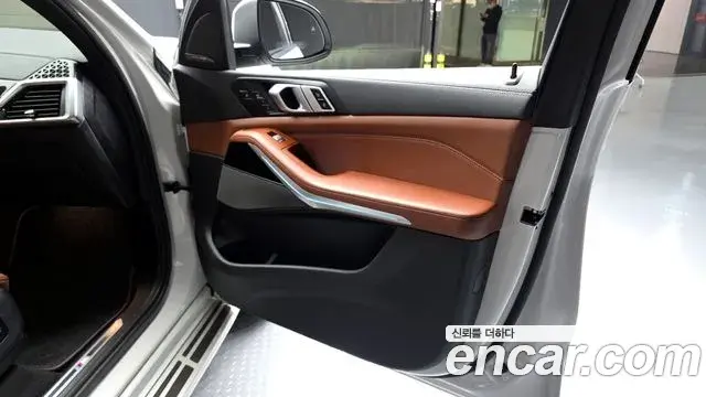 BMW X7 2024 — ფოტო 1/34