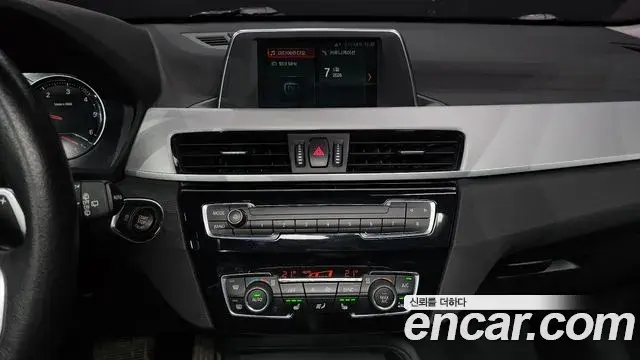 BMW X1 2020 — ფოტო 1/20