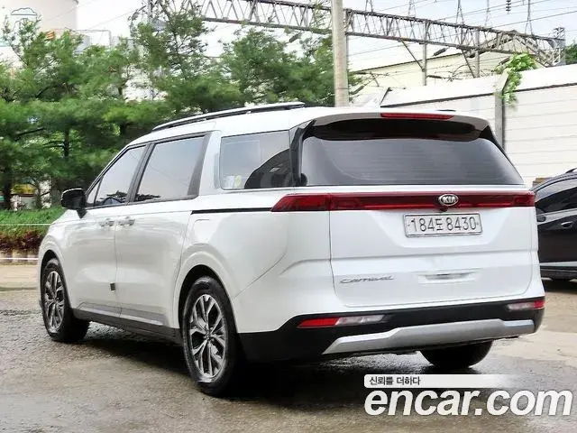 Kia Carnival 2021 — ფოტო 4/20
