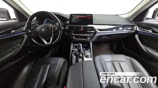BMW 5 Series 2018 — Фото 7/20