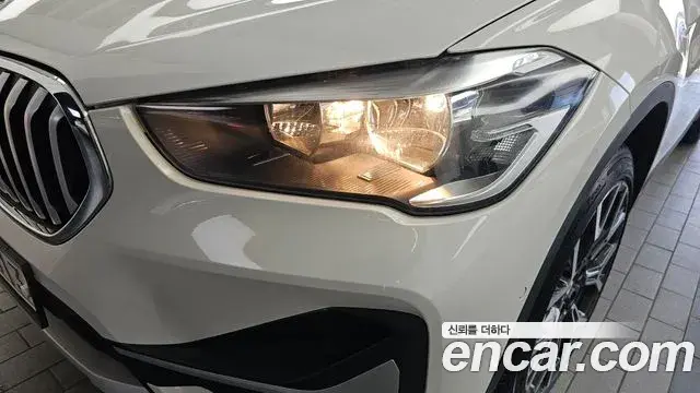 BMW X1 2022 — ფოტო 26/34