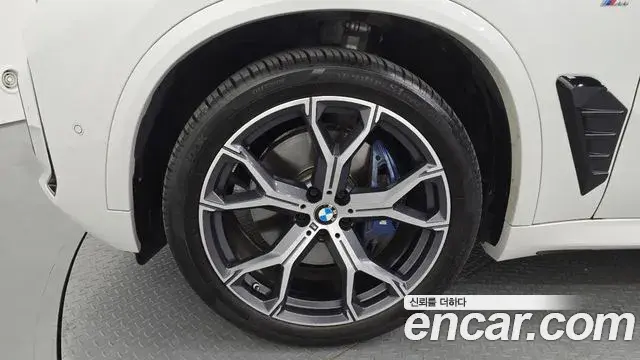 BMW X5 2024 — ფოტო 11/35