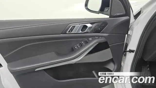 BMW X5 2024 — ფოტო 25/35
