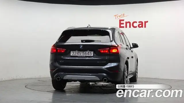 BMW X1 2022 — ფოტო 15/20