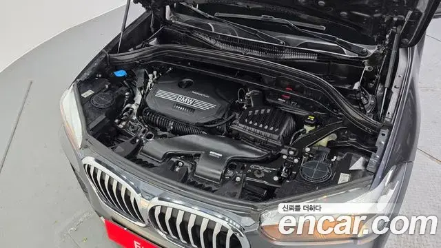 BMW X1 2022 — ფოტო 19/20