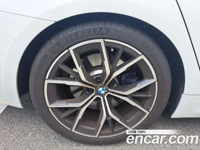 BMW 5 Series 2023 — Фото 12/20