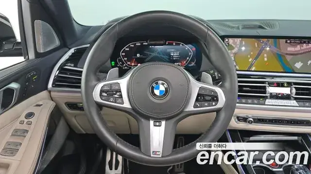 BMW X7 2020 — ფოტო 7/20