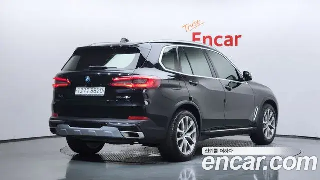 BMW X5 2019 — ფოტო 14/34