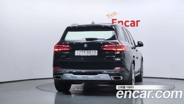 BMW X5 2019 — ფოტო 27/34