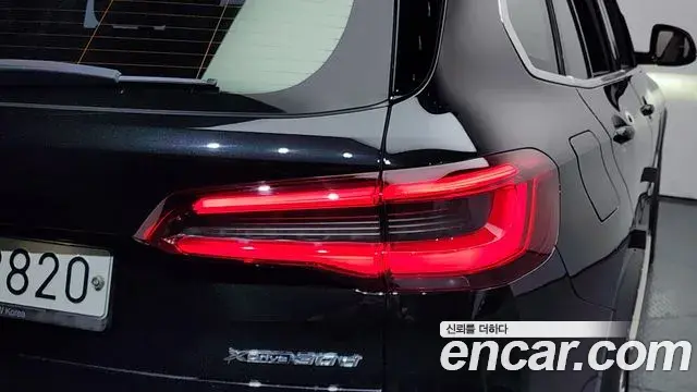 BMW X5 2019 — ფოტო 18/34