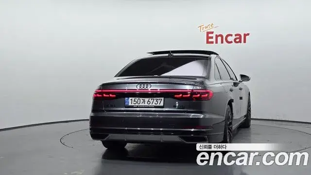 Audi A8 2021 — Фото 4/20