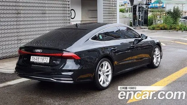 Audi A7 2023 — Фото 1/20