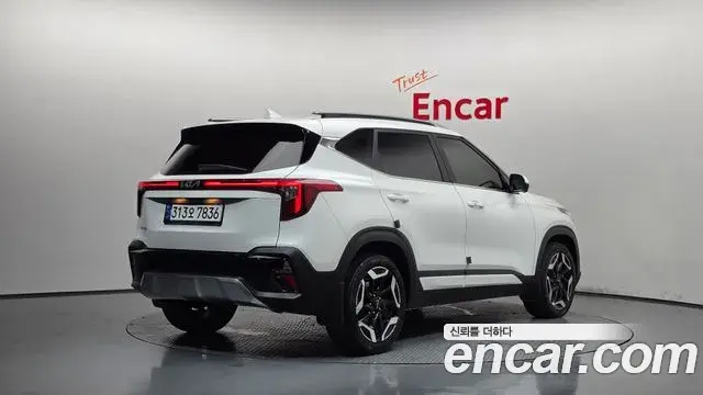 Kia Seltos 2024 — ფოტო 14/34