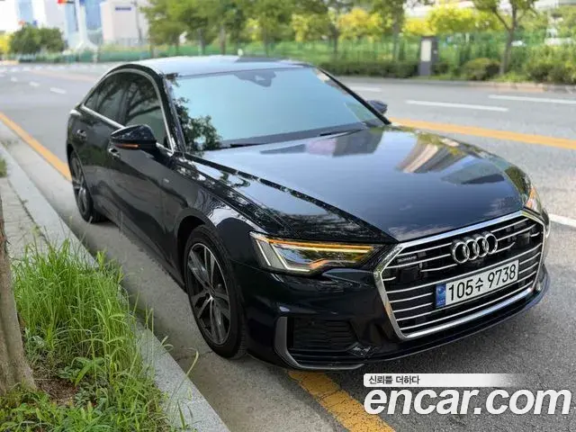Audi A6 2020 — Фото 1/8