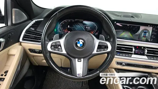 BMW X6 2021 — Фото 12/20