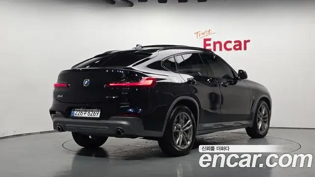 BMW X4 2021 — Фото 2/20