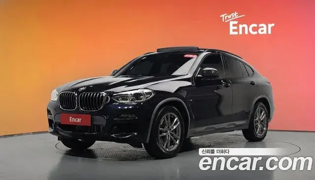 BMW X4 2021 — Фото 1/20