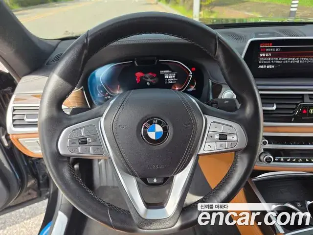 BMW 7 Series 2022 — Фото 12/20