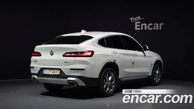 BMW X4 2022 — Фото 1/20