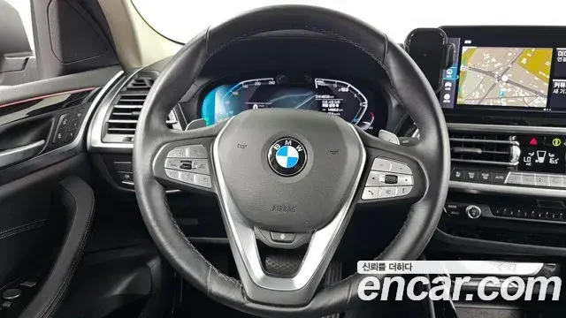 BMW X4 2022 — Фото 12/20