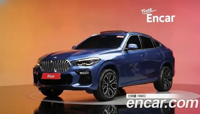 BMW X6 2020 — Фото 1/20
