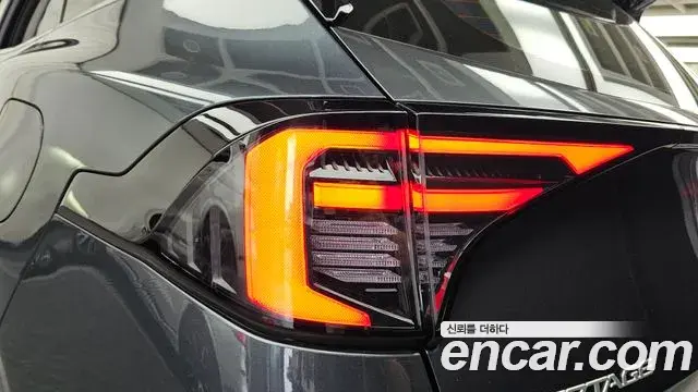 Kia Sportage 2024 — Photo 2/31