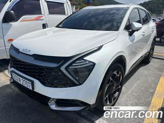 Kia Sportage 2021 — Фото 1/18