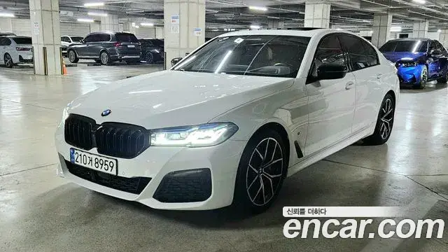 BMW 5 Series 2023 — Фото 10/20