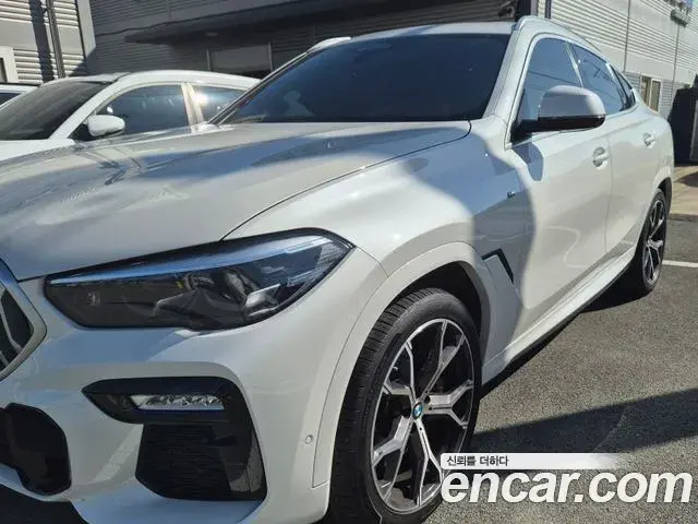 BMW X6 2020 — Фото 1/14