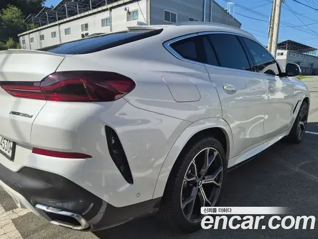 BMW X6 2020 — Фото 2/14