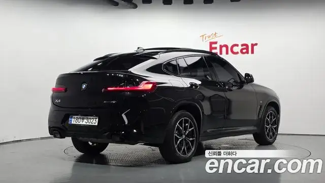 BMW X4 2023 — Фото 2/20