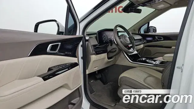 Kia Carnival 2022 — Фото 8/20