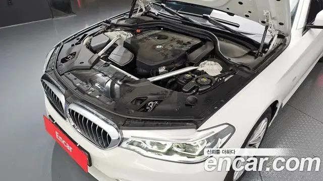 BMW 5 Series 2018 — Фото 6/20