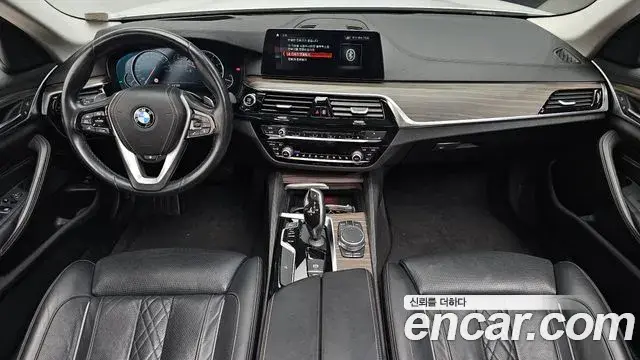 BMW 5 Series 2018 — Фото 7/20
