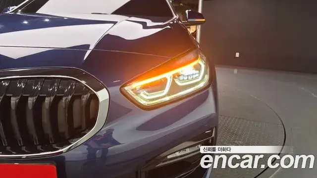 BMW 1 Series 2023 — ფოტო 18/32