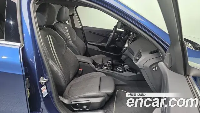 BMW 1 Series 2023 — ფოტო 25/32