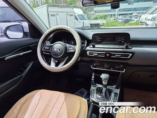 Kia Seltos 2021 — ფოტო 1/18